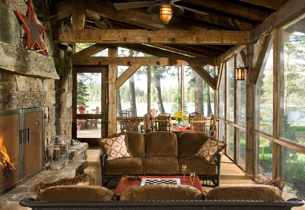 early-american-living-room-rustic-with-timber-frame-display-and-wall-shelves